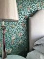 William Morris wallpaper in Arts & Crafts bedroom